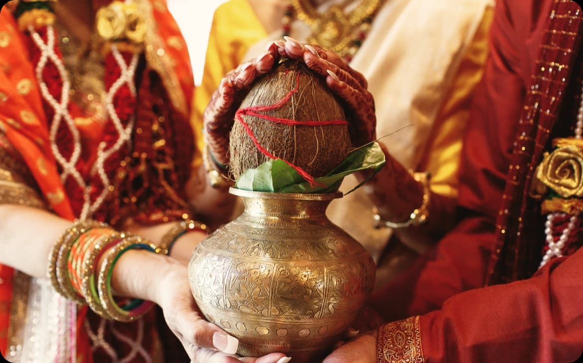 Indian wedding ritual with coconut offered by parents
